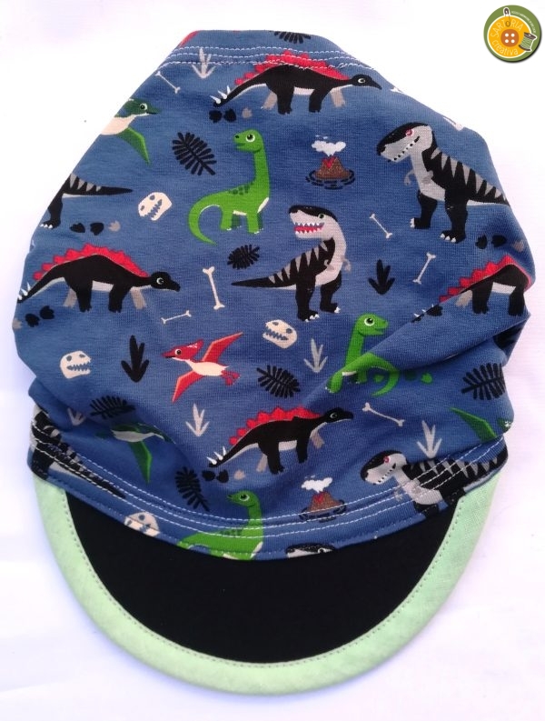 1.8 Fascia baby con visiera DINOSAURI
