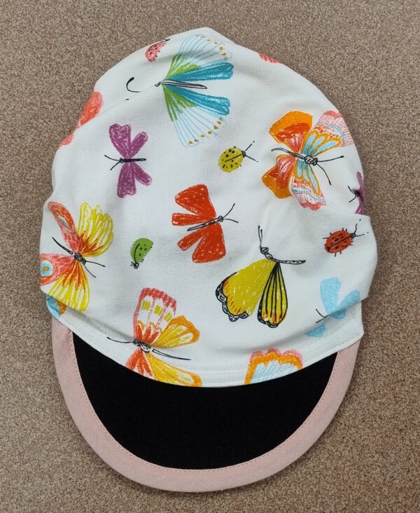 1.1 Fascia baby con visiera FARFALLE COLOR