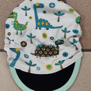 1.9 Fascia baby con visiera DINOSAURI BIANCO